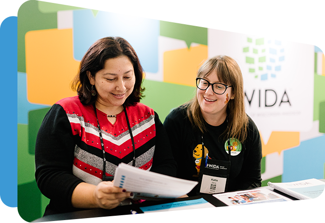 two wida staffers at a wida info conference booth