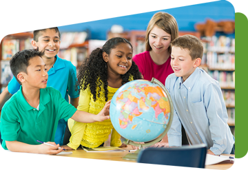 group of students around a globe