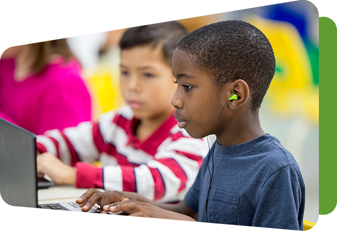 two boys at computers