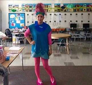 Leech standing in classroom dressed as troll