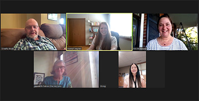 Screenshot of a Zoom meeting with five people