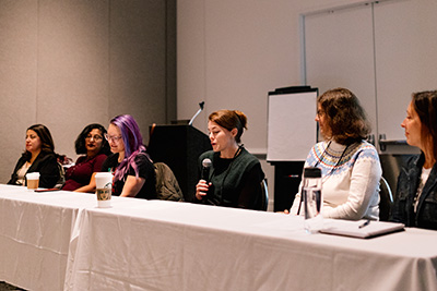 A panel of educators at the 2023 WIDA Annual Conference, one of whom is speaking