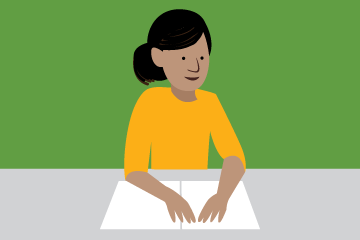 Person reading braille.