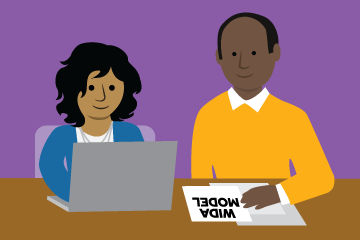 Illustration of a student and teacher sitting side by side at a table. The student is looking at a laptop screen and the teacher is looking at a piece of paper that says WIDA MODEL.