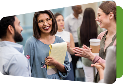 teachers standing and talking in a group