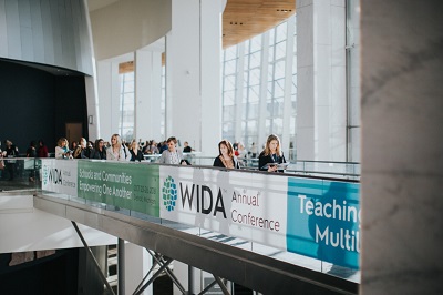 Participants crossing a bridge at the 2018 WIDA Annual Conference